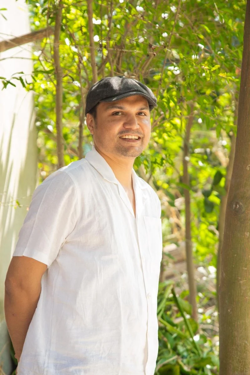 ATM Ridwanul Haque standing outdoors